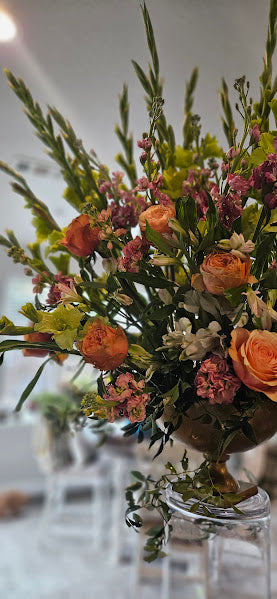 Roses and Gladiolus in Brass Urn